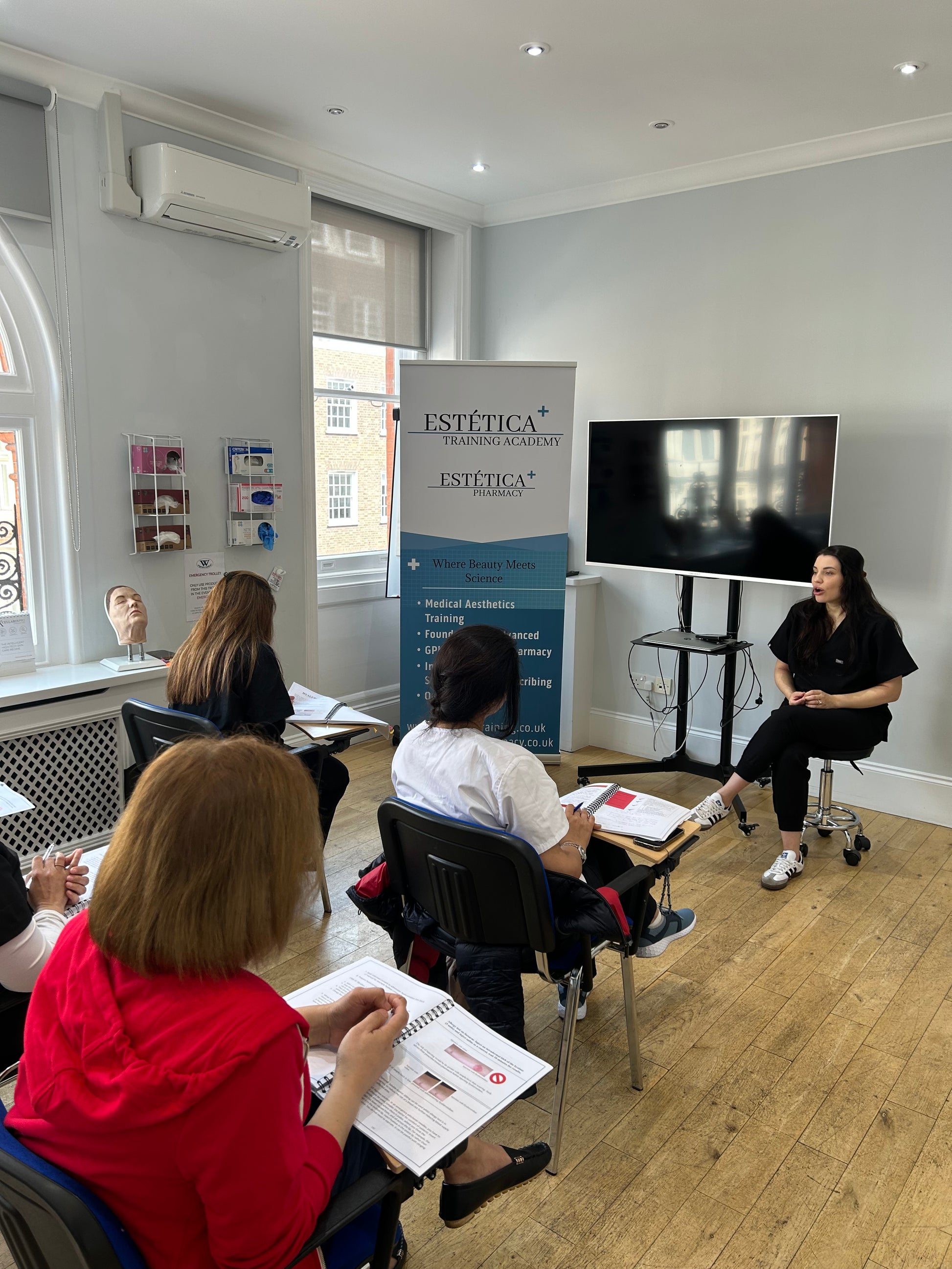 Teacher going through theory aspect of the foundation filler  course 